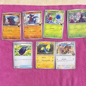 7 Japanese Pokemon Trading Card Set with Red, Yellow, and Blue Accents